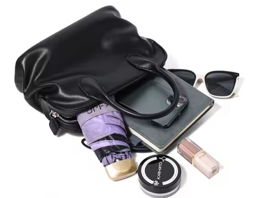 AMBRA borsa a conchiglia in pelle